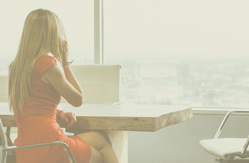 Professional woman on phone in office